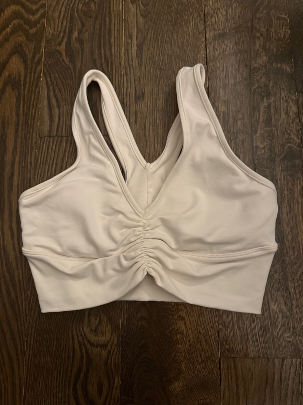 ALO Yoga Cream Ruched V‑Neck Workout Bra